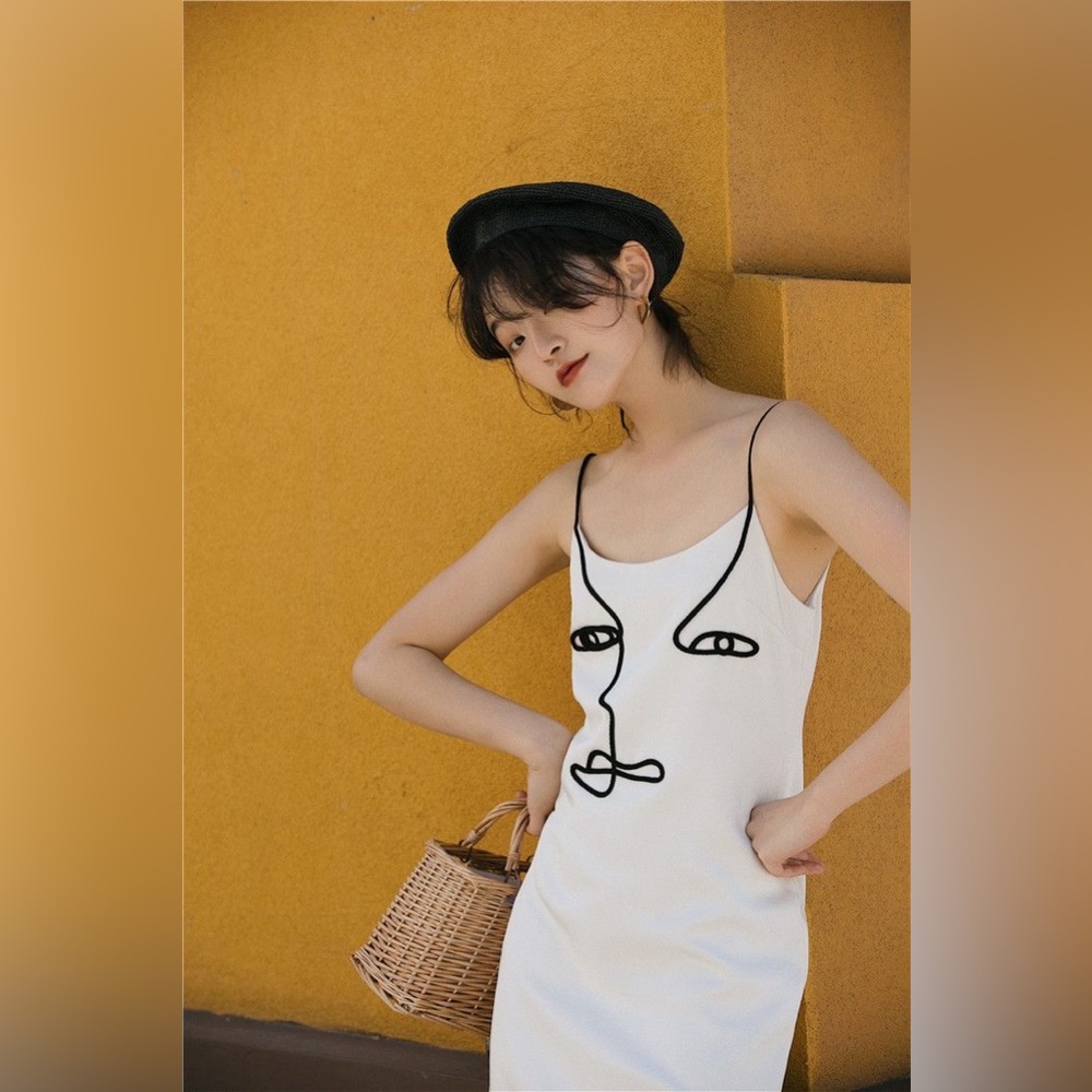 Cute artsy dress with face